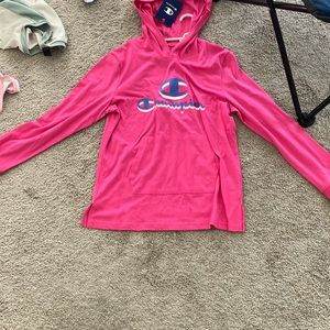 This is champion it is in the color hot pink and it is never worn has tags